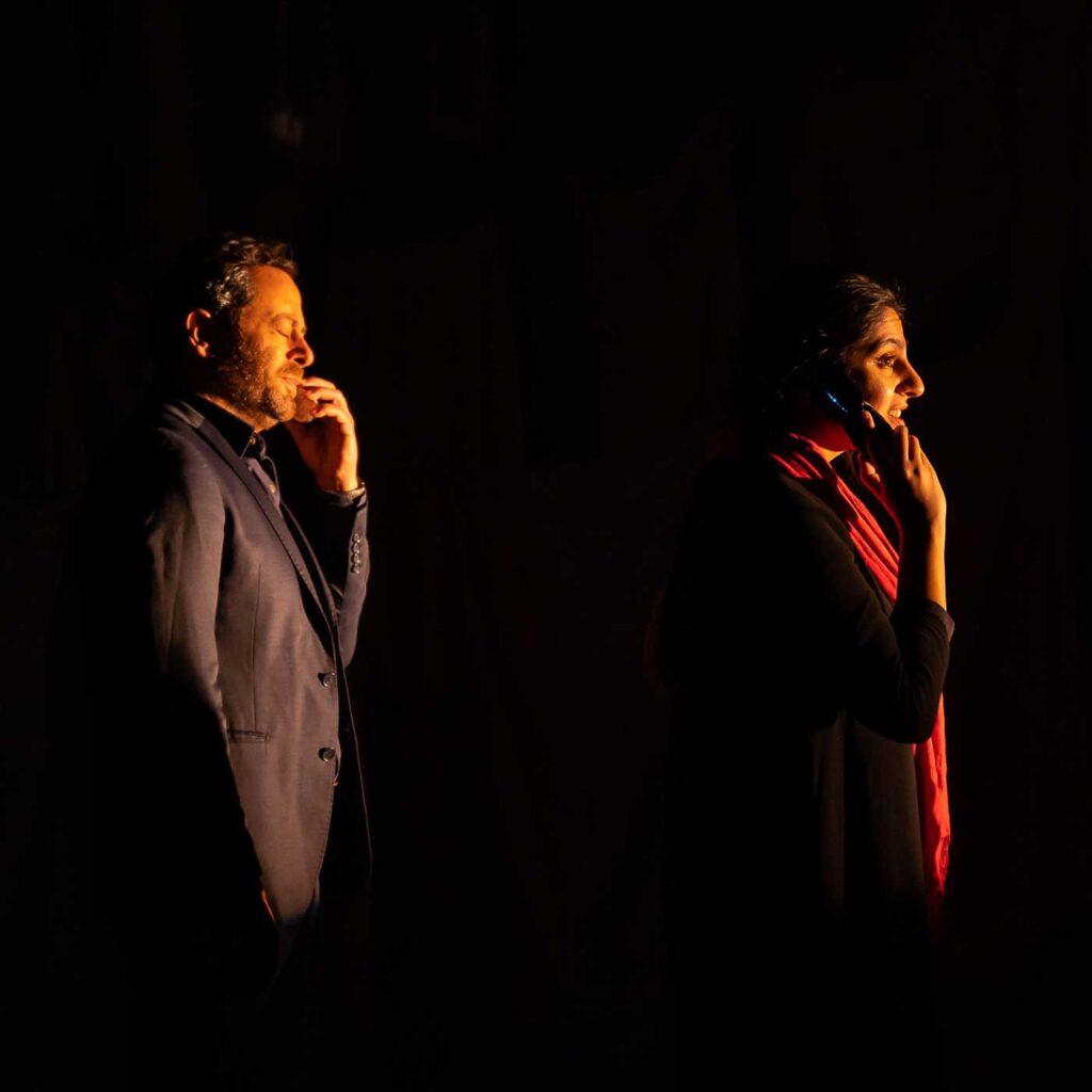 Moustapha Akkad has a cellphone conversation with his daughter Rima, in profile, in the stage play The Last 15 Seconds.