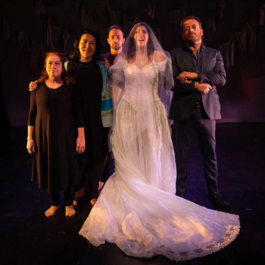 Moustapha Akkad and his family assemble for a family photo during his daughter Rima's marriage, an uninvited guest tries to photobomb, in the stage play The Last 15 Seconds.