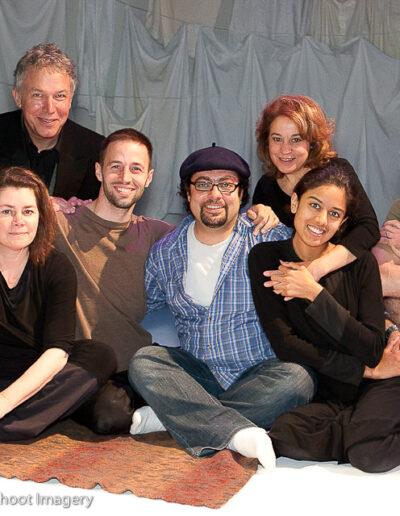 Cast of Last 15 Seconds sitting on ground and posing for camera